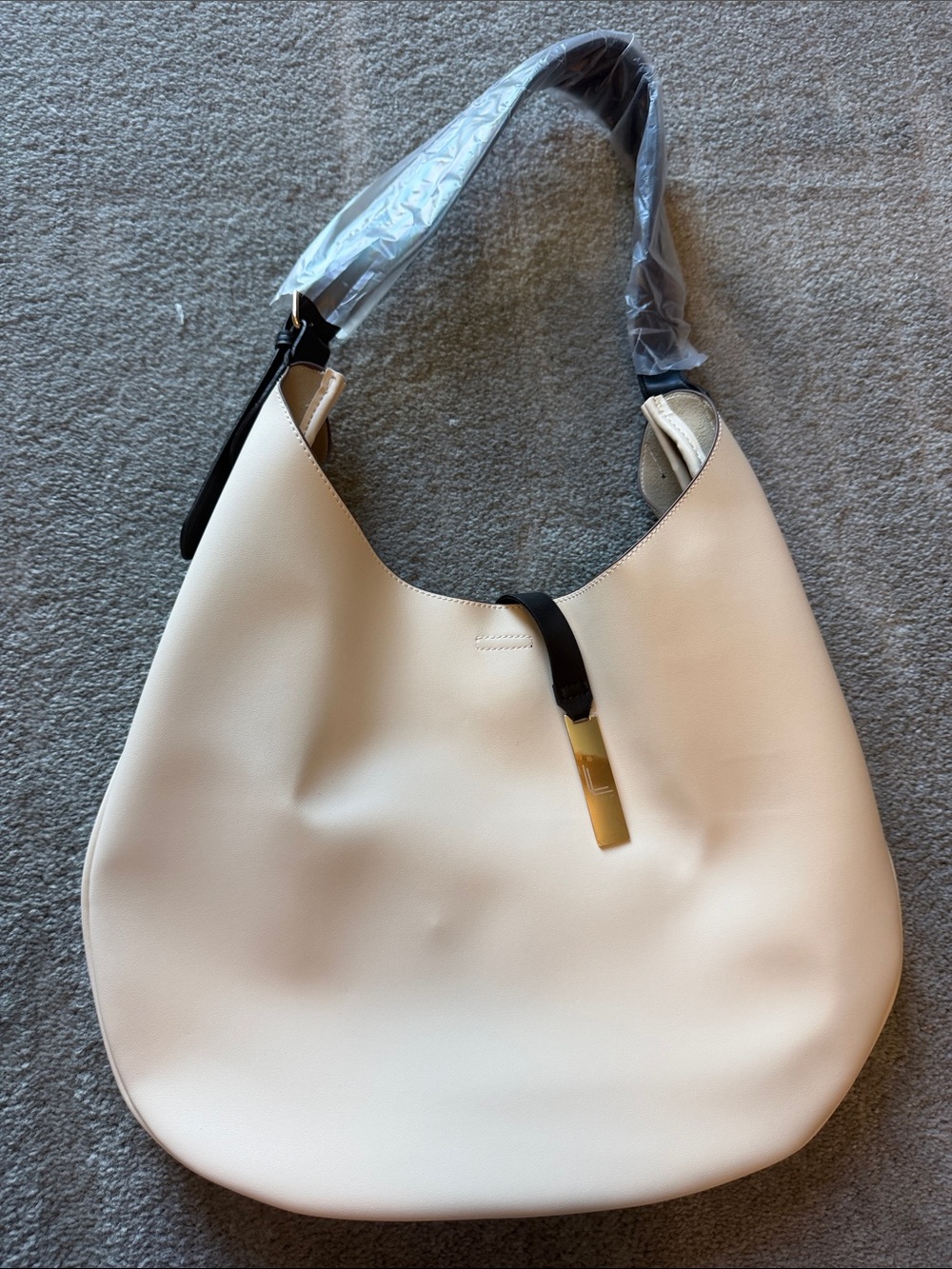 Cream Shoulder Hobo Bag with Black Strap and Gold Accent